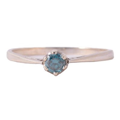 Lot 68 - A blue/turquoise diamond solitaire ring.