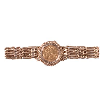 Lot 269 - A Gold Half Sovereign gate link bracelet.
