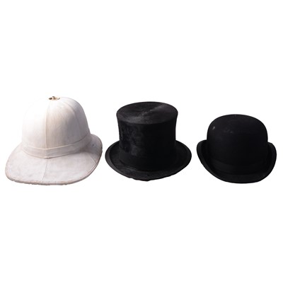 Lot 128 - Black silk top hat, bowler hat and a pith helmet