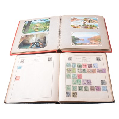 Lot 101 - 1930s Stamp album, a scrapbook, and six albums of postcards