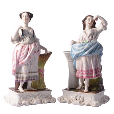 Lot 24 - Two Continental porcelain figural spill vases