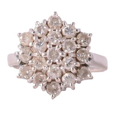 Lot 229 - A diamond cluster ring.