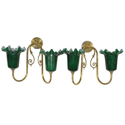 Lot 187 - Set of four brass and glass wall lights