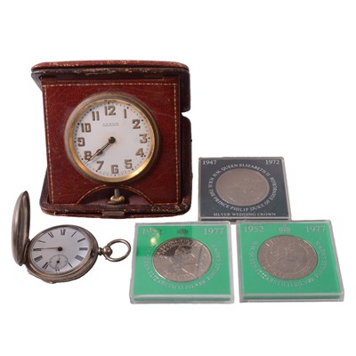 Lot 284 - A white metal pocket watch, leather-cased travel clock, coins, and leather wallet.