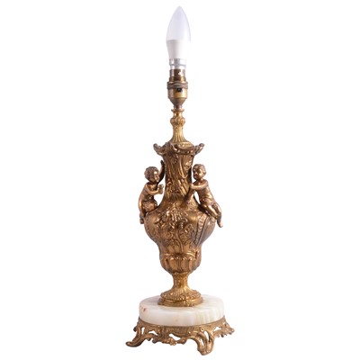 Lot 91 - A gilt metal and onyx lamp