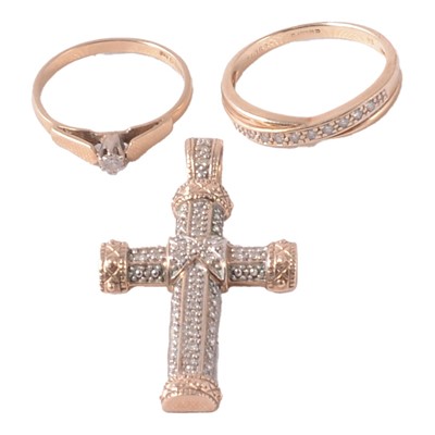Lot 259 - Two diamond rings; and a diamond set cross pendant.