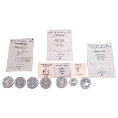 Lot 209 - Six silver coins, and one silver-plated coin.