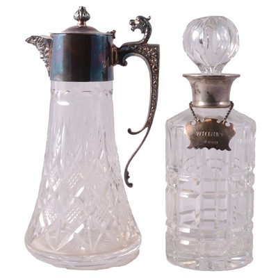 Lot 299 - Two silver-mounted cut-glass decanters