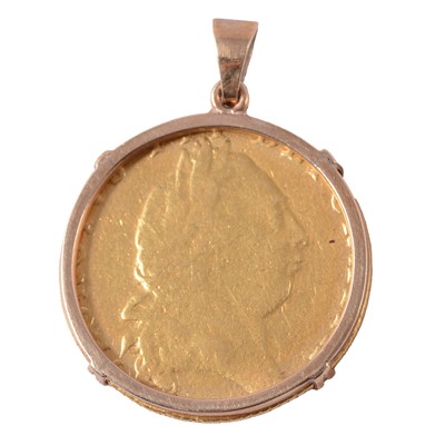 Lot 272 - A Gold Spade Guinea Coin, George III 1792, claw set in a plain yellow metal mount.
