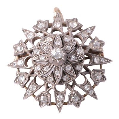Lot 200 - A diamond set circular domed brooch pendant.