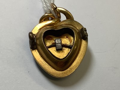 Lot 245 - A yellow metal heart shape pendant brooch set with turquoise.