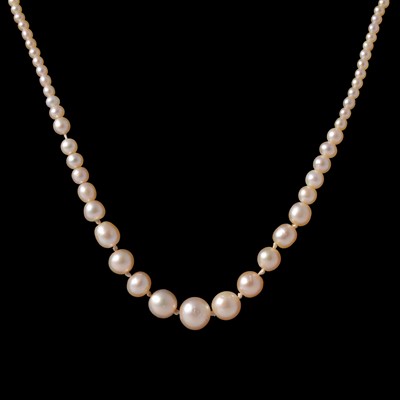Lot 322 - A cultured pearl necklace with sapphire, diamond and pearl clasp.