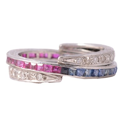 Lot 42 - A sapphire, ruby and diamond night and day eternity ring.