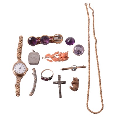 Lot 312 - A lady's 9 carat yellow gold watch, white metal crucifix, silver locket, and other jewellery.