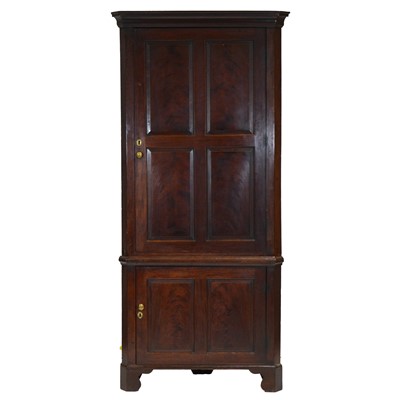 Lot 369 - George III mahogany freestanding corner cupboard