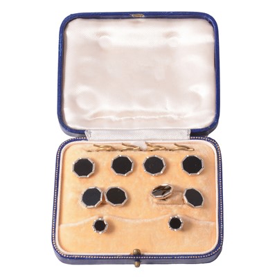 Lot 340 - A set of black onyx dress studs, buttons and cufflinks.