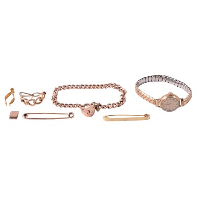 Lot 311 - A rose metal curb link bracelet, gold wristwatch, bar brooches, scarf clip, and scrap yellow metal.