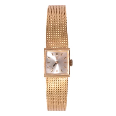 Lot 340 - Omega - a lady's 18 carat yellow gold bracelet watch.
