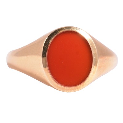 Lot 246 - An 18 carat yellow gold signet ring set with an oval cornelion.