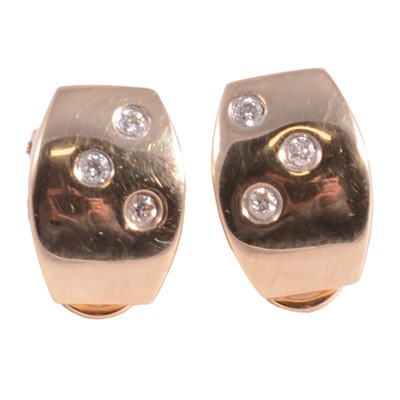 Lot 294 - A pair of diamond set clip on earrings.