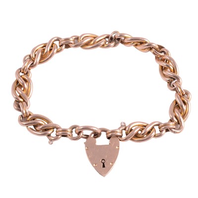 Lot 305 - A rose metal bracelet with padlock fastener.