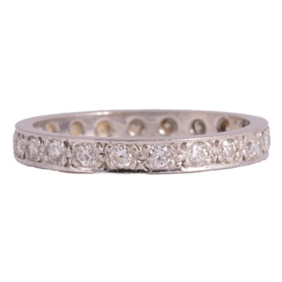 Lot 232 - A diamond full eternity ring.