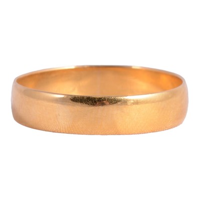 Lot 249 - A 22 carat yellow gold wedding band.
