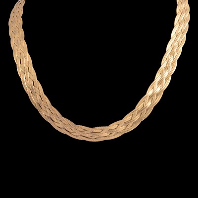 Lot 326 - A 9 carat yellow gold plaited necklace and matching bracelet.