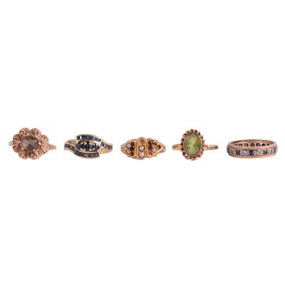 Lot 243 - Five gemset rings.