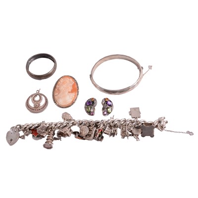 Lot 351 - A collection of silver jewellery, charm bracelet, chains. rings, cameo brooch.