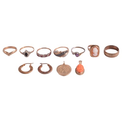 Lot 254 - Seven rings, a coral pendant, St Christopher and pair of earrings.