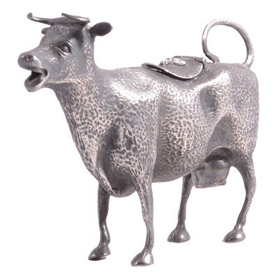 Lot 177 - White metal cow creamer