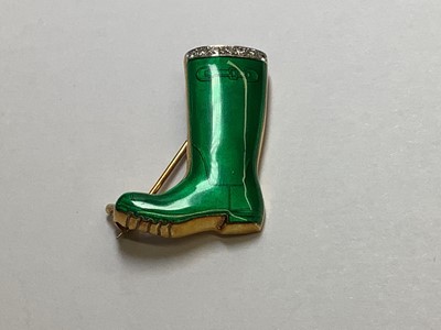 Lot 211 - Alabaster & Wilson - a 9 carat yellow gold and green enamel Wellington boot brooch.