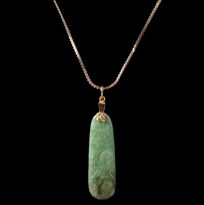 Lot 328 - Two carved jadeite pendants on chains.