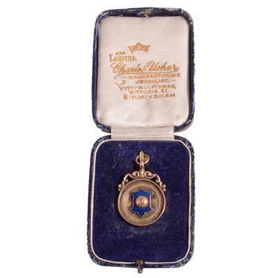 Lot 332A - 9ct gold football medal