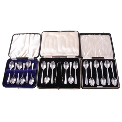 Lot 240 - Three sets of silver teaspoons, all cased.