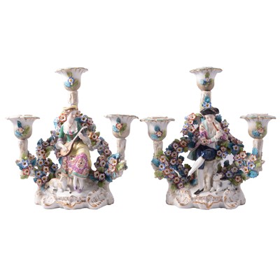 Lot 11 - Pair of continental three branch candelabra.