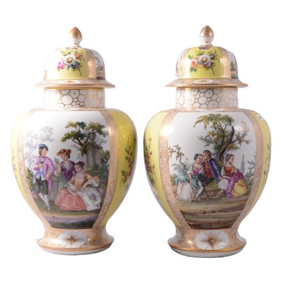 Lot 15 - A pair of Helena Wolfsohn Dresden yellow-ground vases and covers in the style of Augustus Rex.