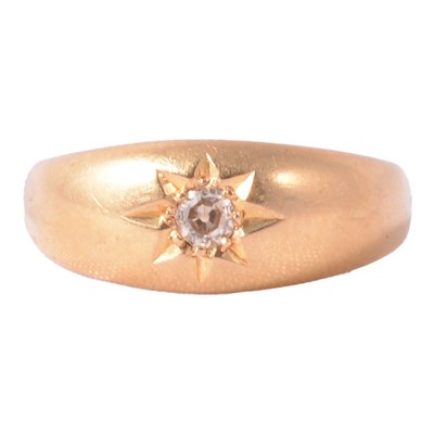 Lot 143 - An Edwardian 18 carat gold ring star gypsy set with a diamond.