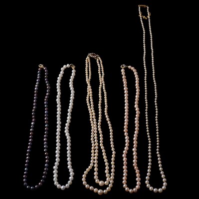Lot 321 - Two cultured pearl necklaces, and three strings of freshwater pearls.