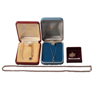 Lot 299 - A yellow metal belcher link chain necklace, maple leaf brooch, two pendants, and chains.