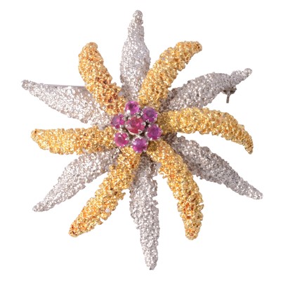 Lot 195 - A starfish brooch marked 18K set with rubies.