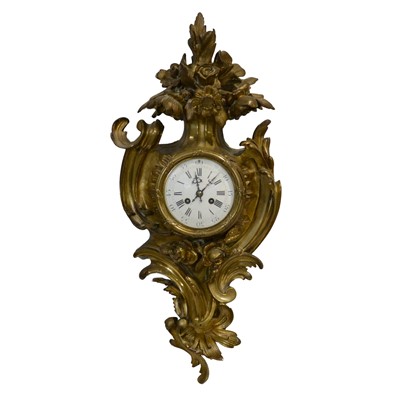 Lot 142 - Louis XV style ormolu cartel clock