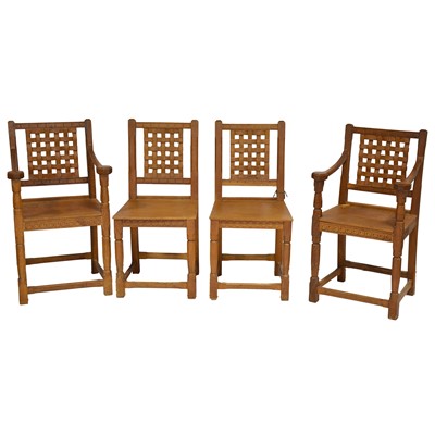 Lot 370 - Yorkshire craftsman made oak dining table and chairs, in the style of Mouseman