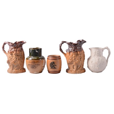 Lot 26 - Doulton Lambeth stoneware tobacco jar, whisky jug, Cobridge jug, etc