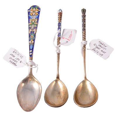 Lot 288 - Two Imperial Russian gilt white metal and cloisonne spoons, and another.