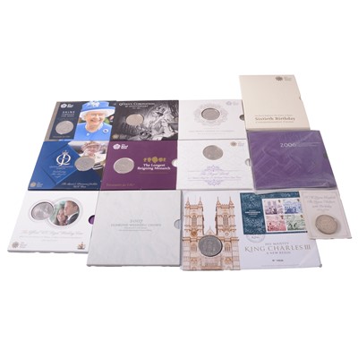 Lot 183 - Twelve Royal Mint Brilliant Uncirculated commemorative £5 coins in presentation packs.