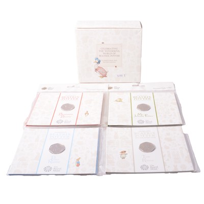 Lot 190 - The Beatrix Potter 2016 50p Five Coin Collection, and four Royal Mint 2017 Beatrix Potter 50p coins.