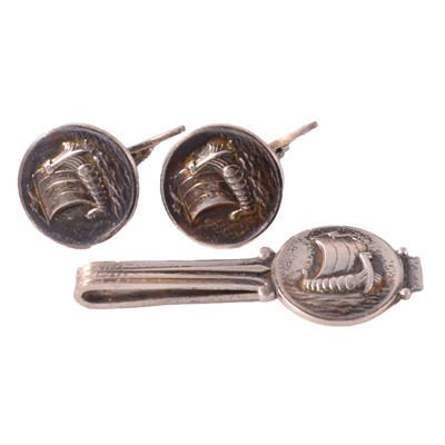 Lot 162 - Georg Jensen - a pair of silver Viking design cufflinks and matching tie-clip.