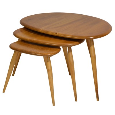 Lot 393 - Ercol, a nest of three 'Pebble' tables